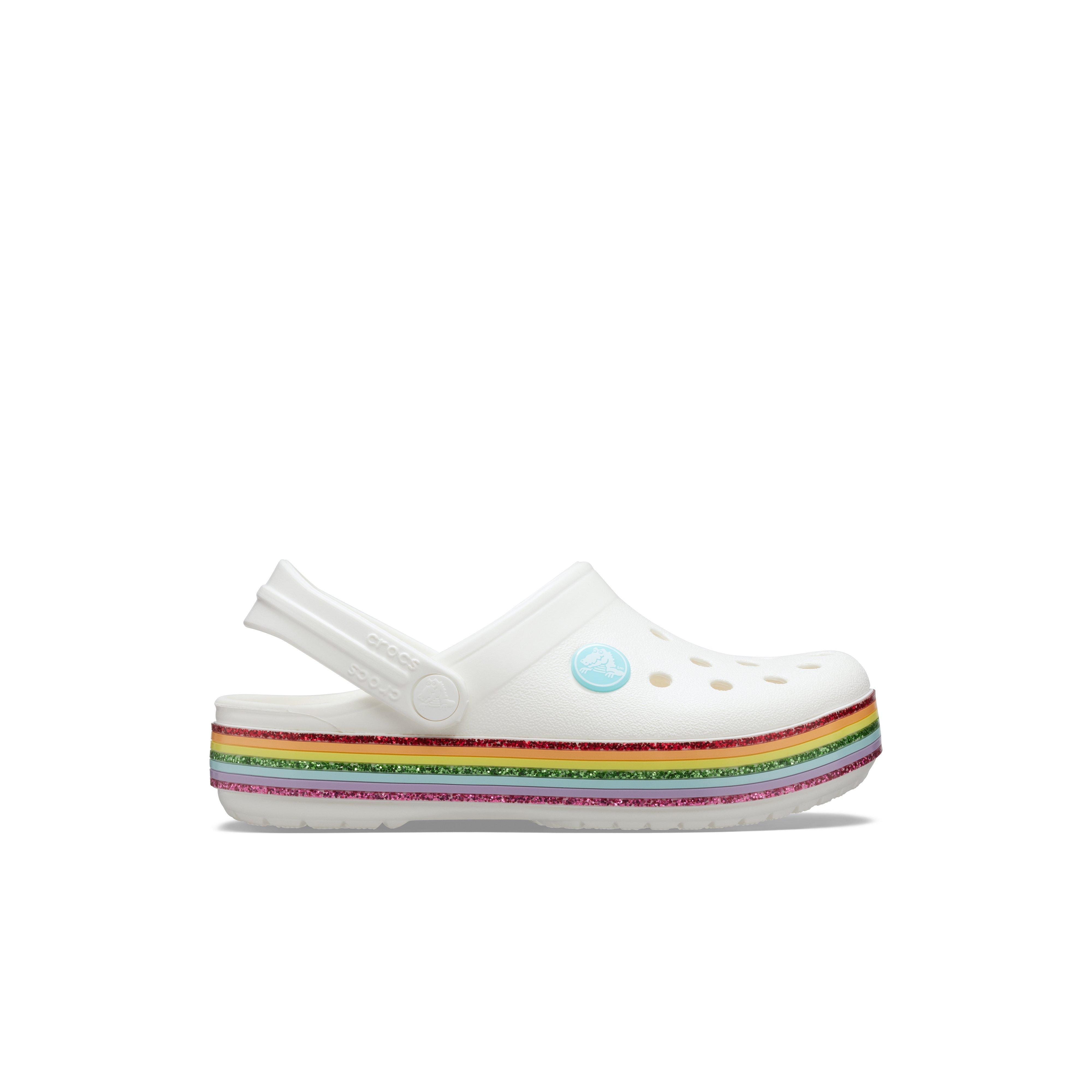 white and rainbow crocs