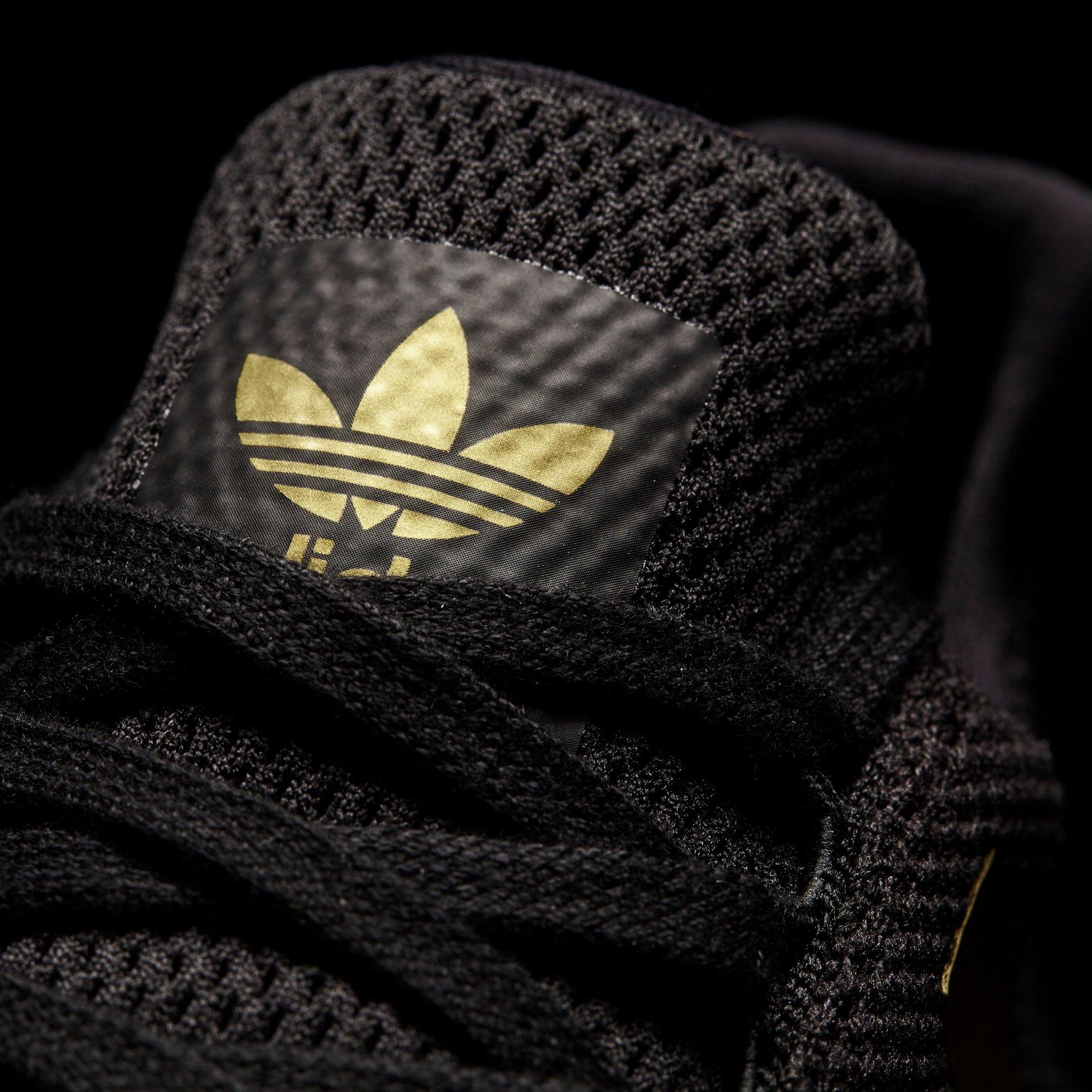 swift run sneaker black and gold