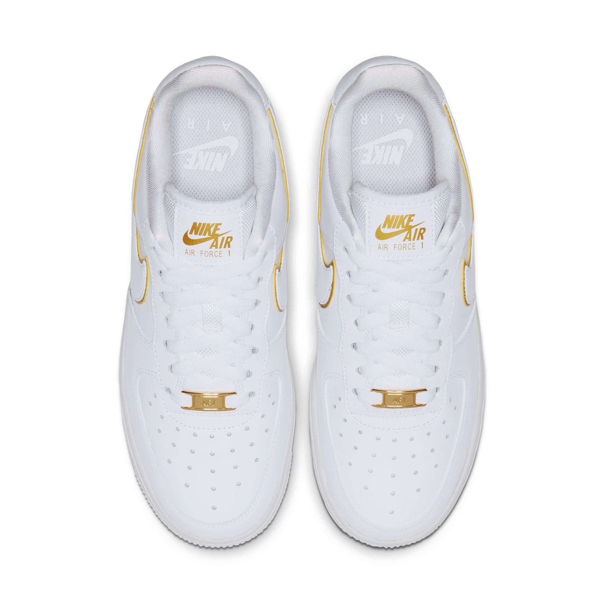 white air force ones with gold trim