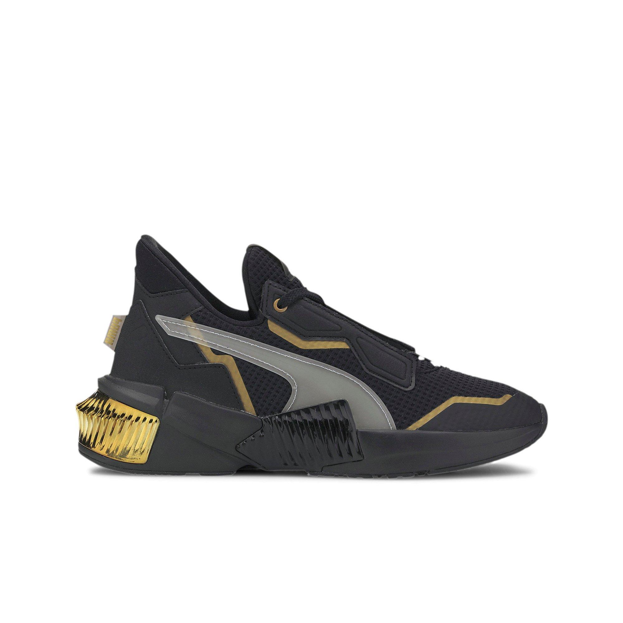 black and gold pumas