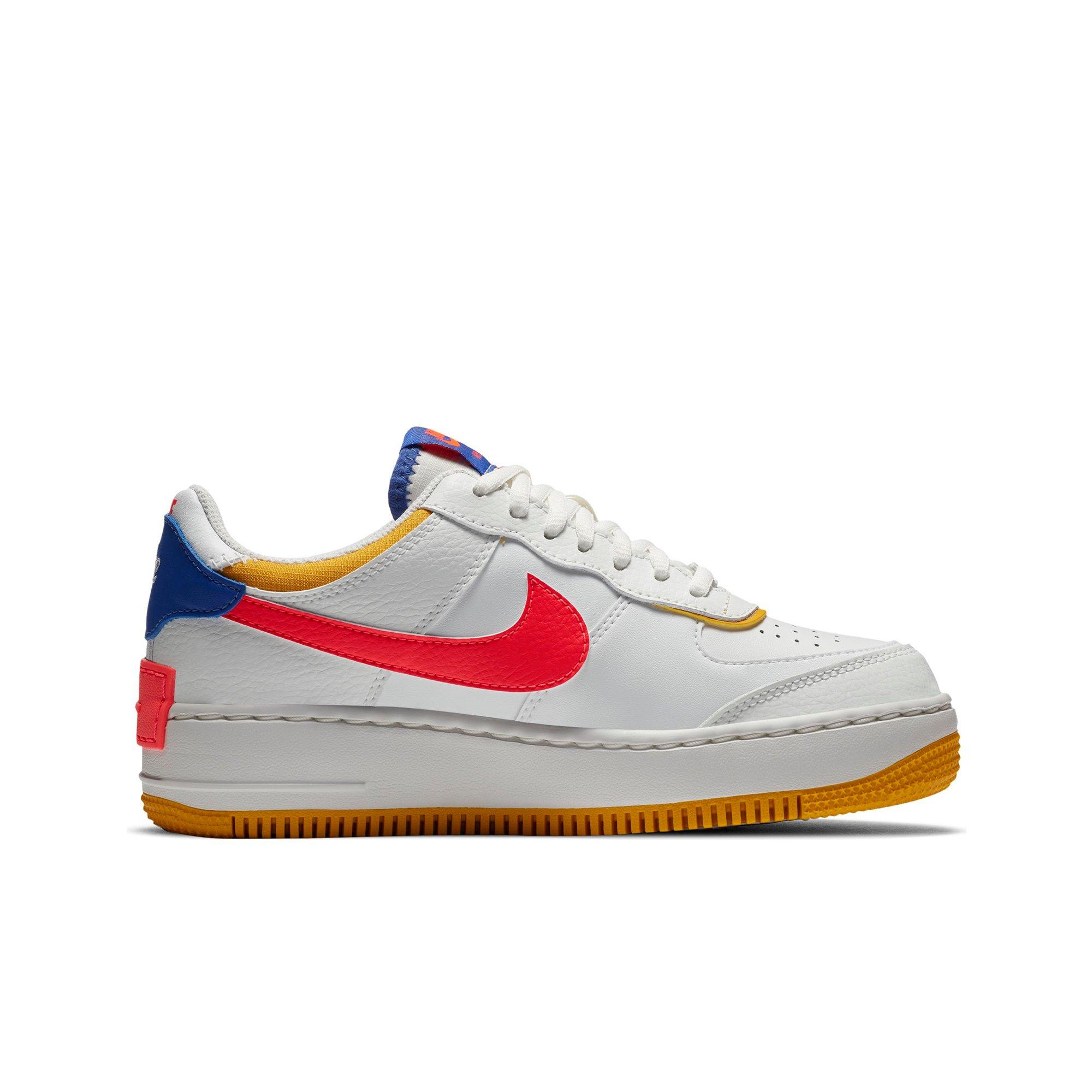 blue red and yellow nikes