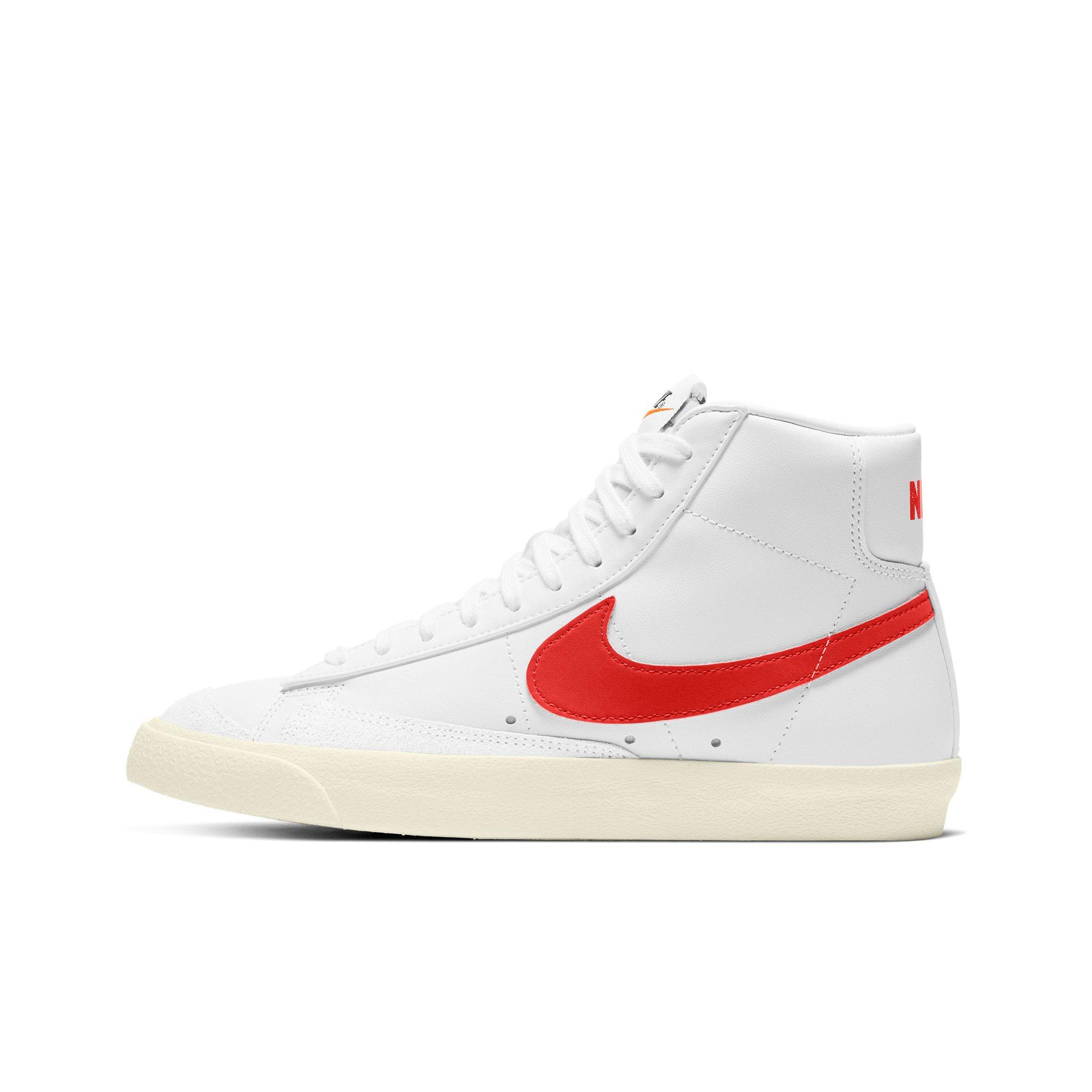 white and red nike blazers