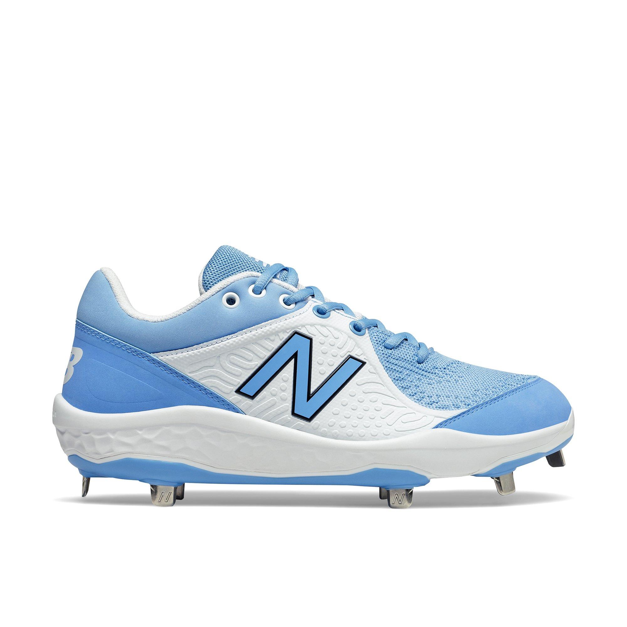 blue and white new balance cleats