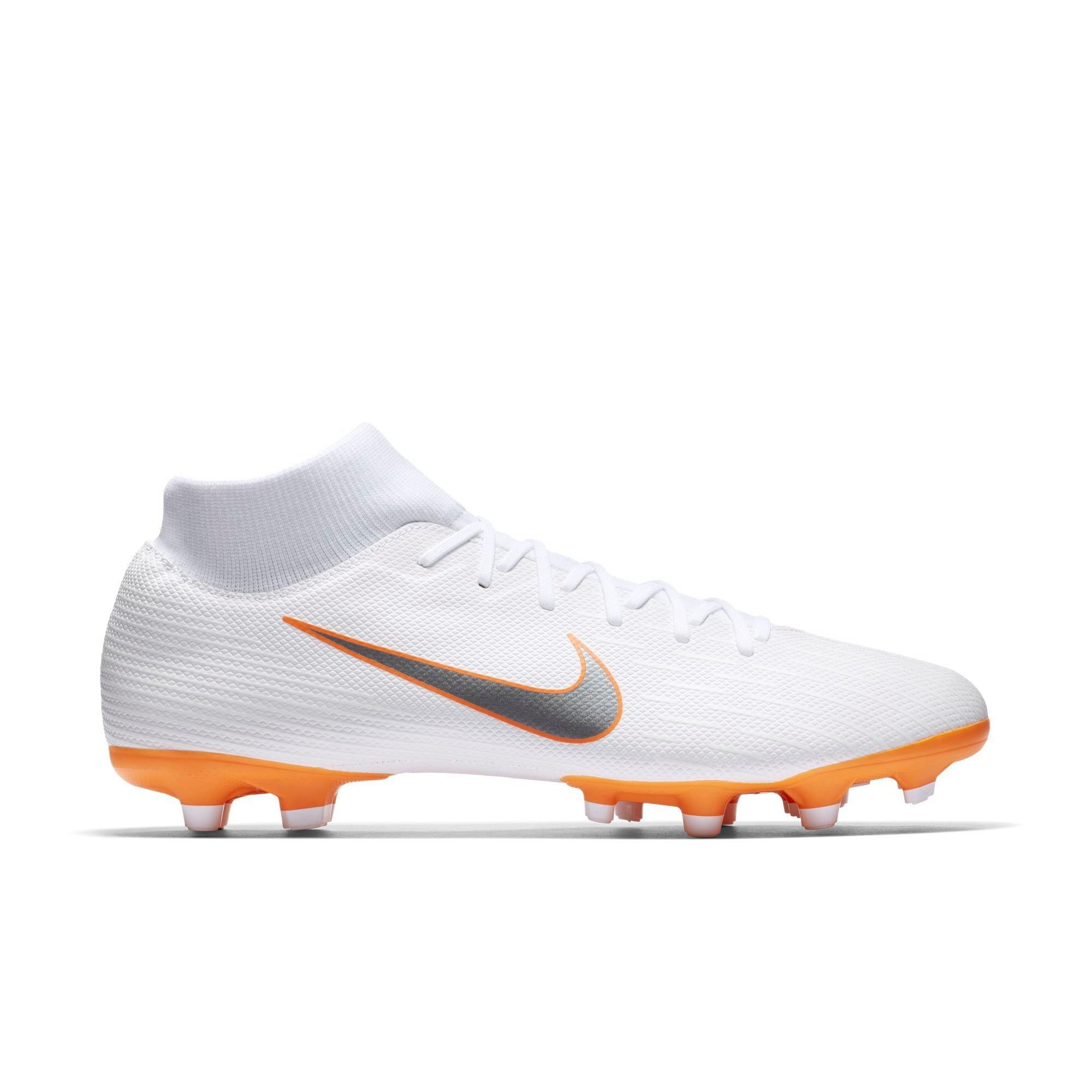 white and orange soccer cleats