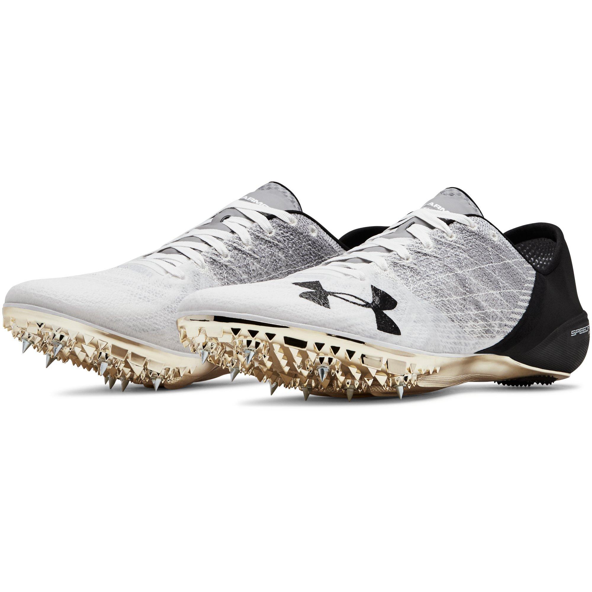 White and gold 2025 track spikes