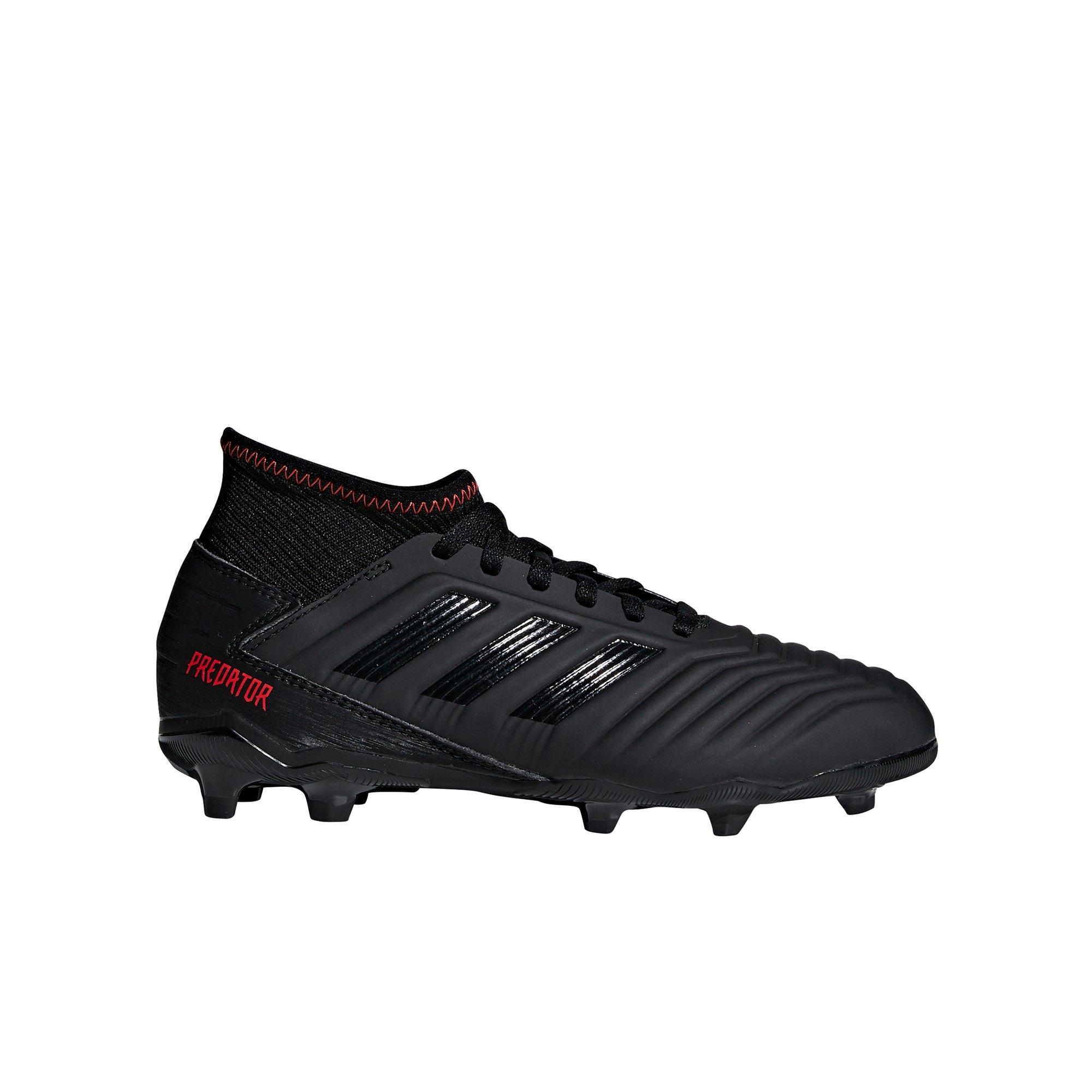 red and black soccer cleats