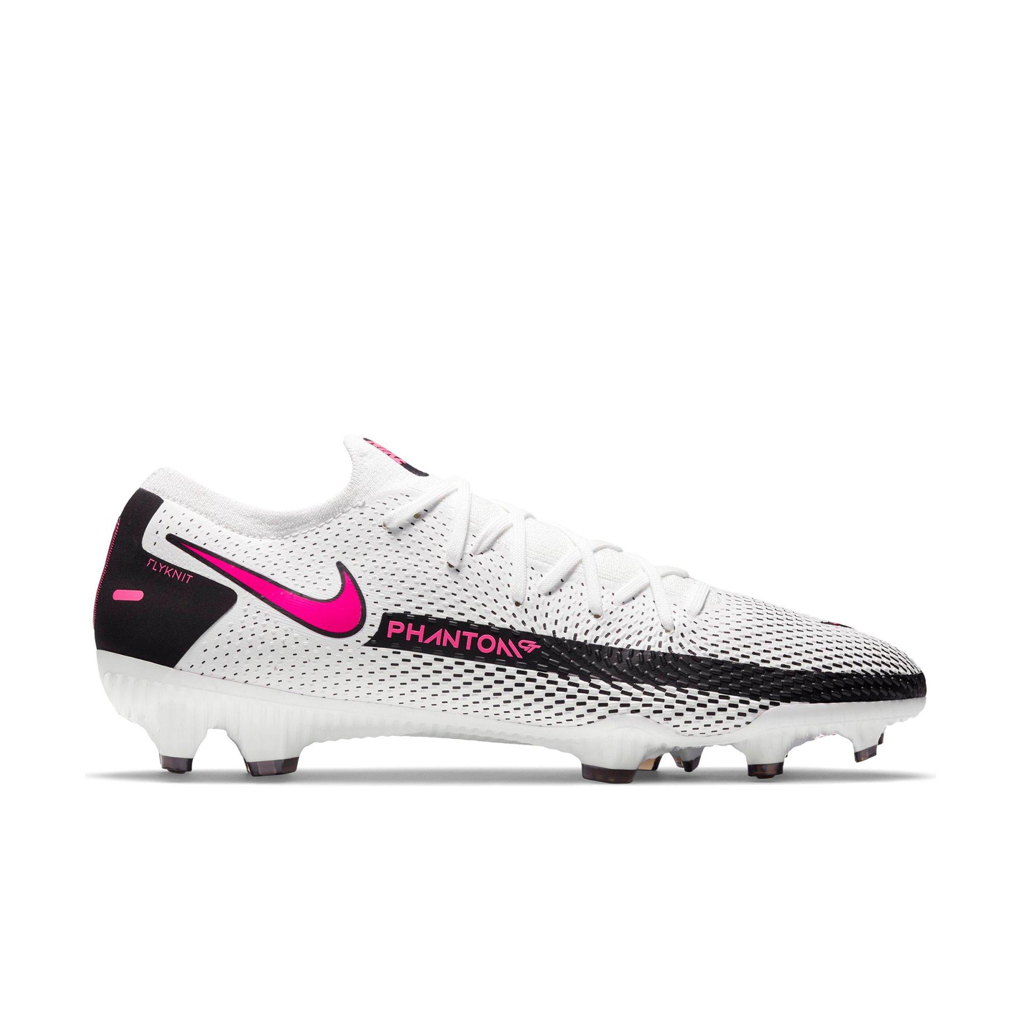 white and pink nike football boots