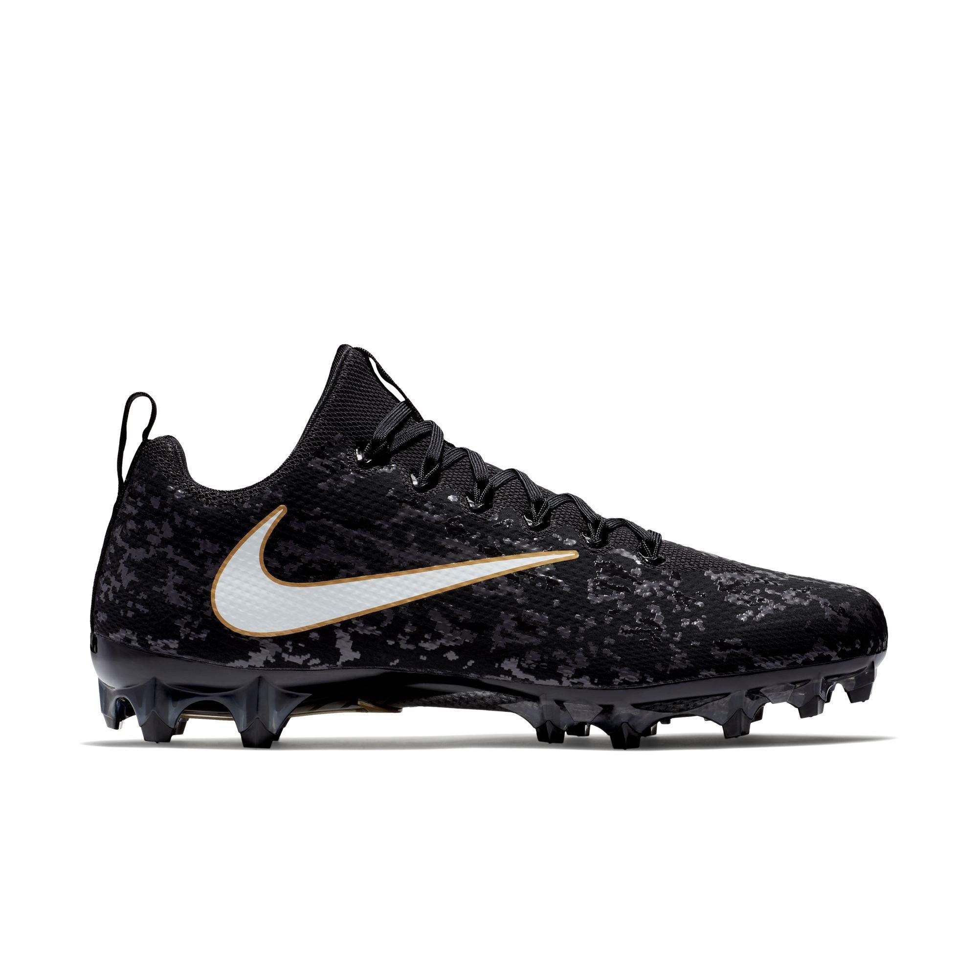 white and black football cleats