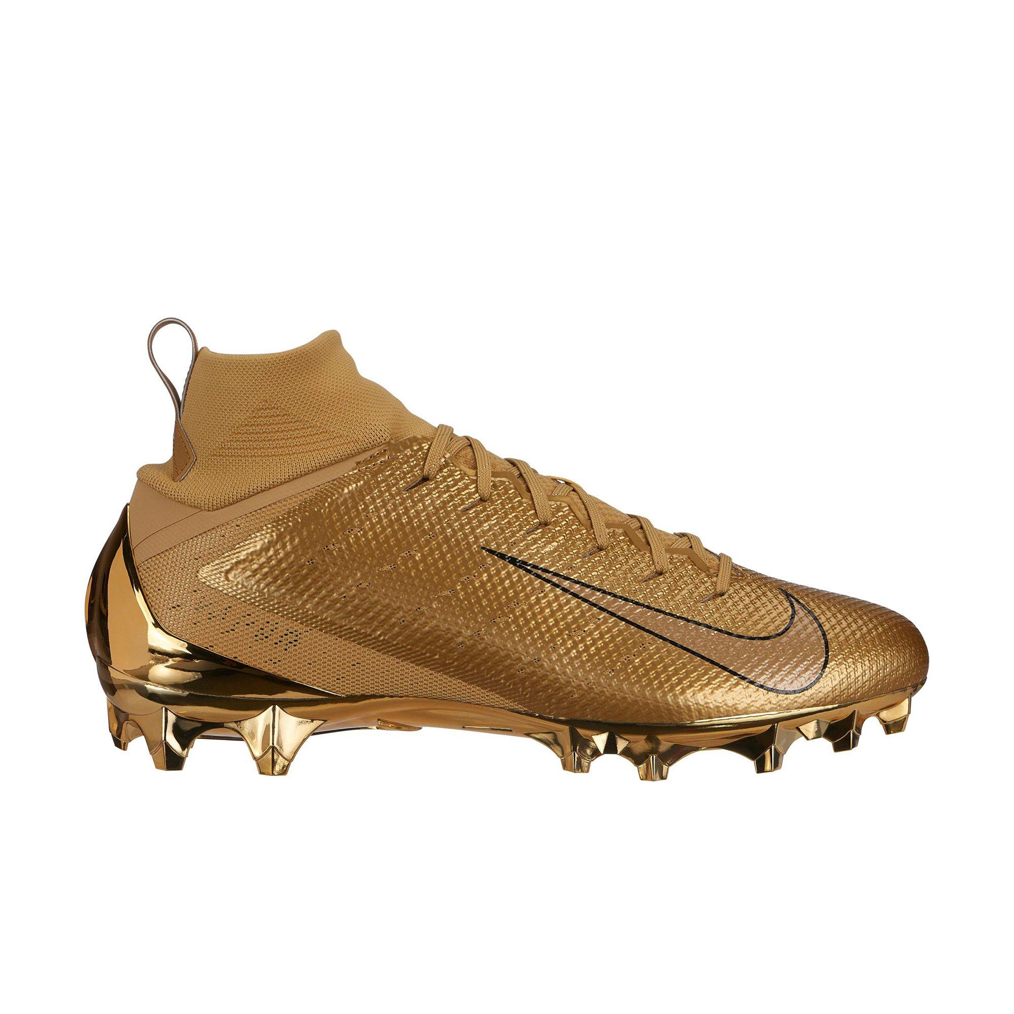nike black and gold football cleats