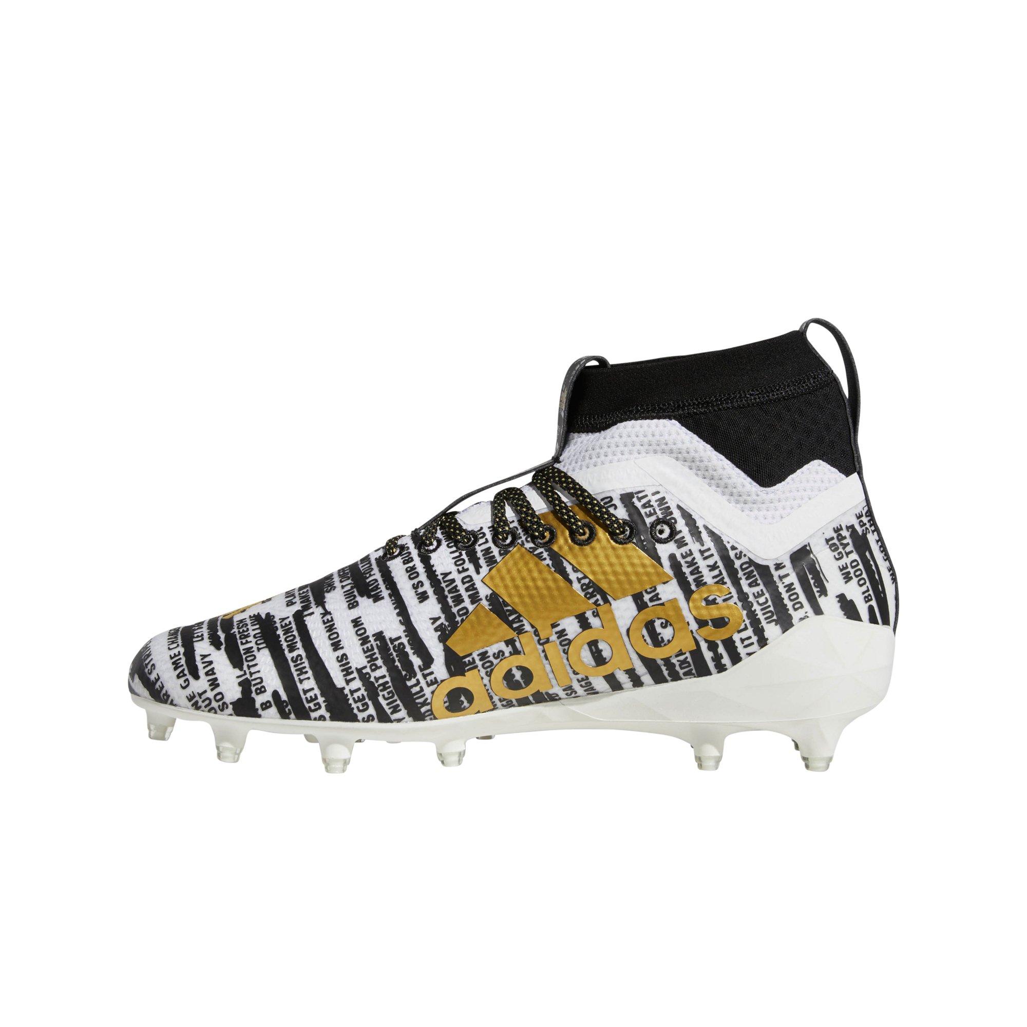 white and gold football cleats