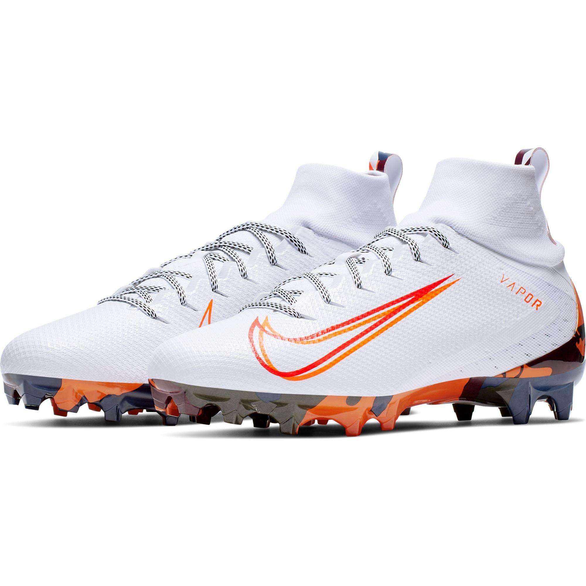 orange and white cleats