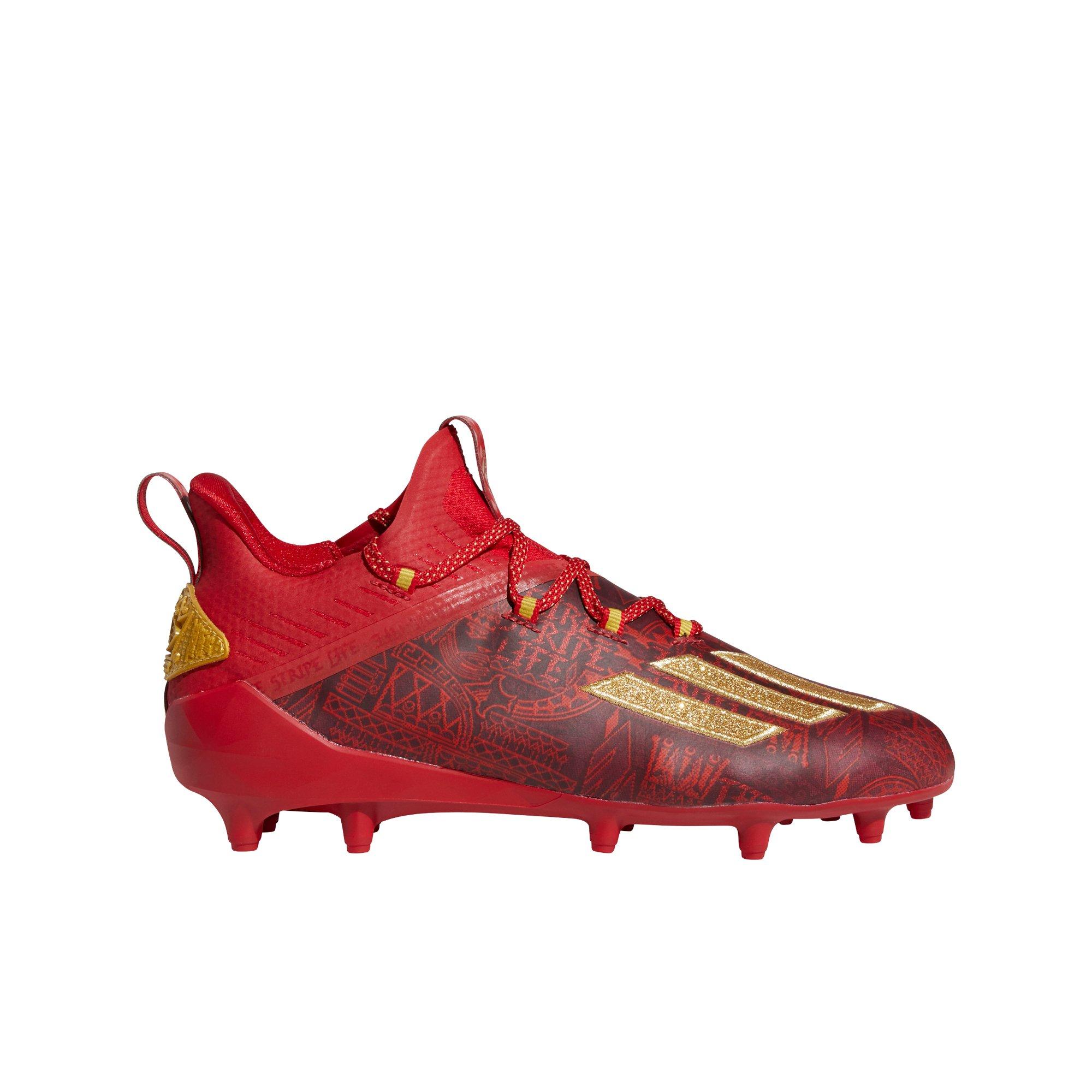 red and gold football cleats