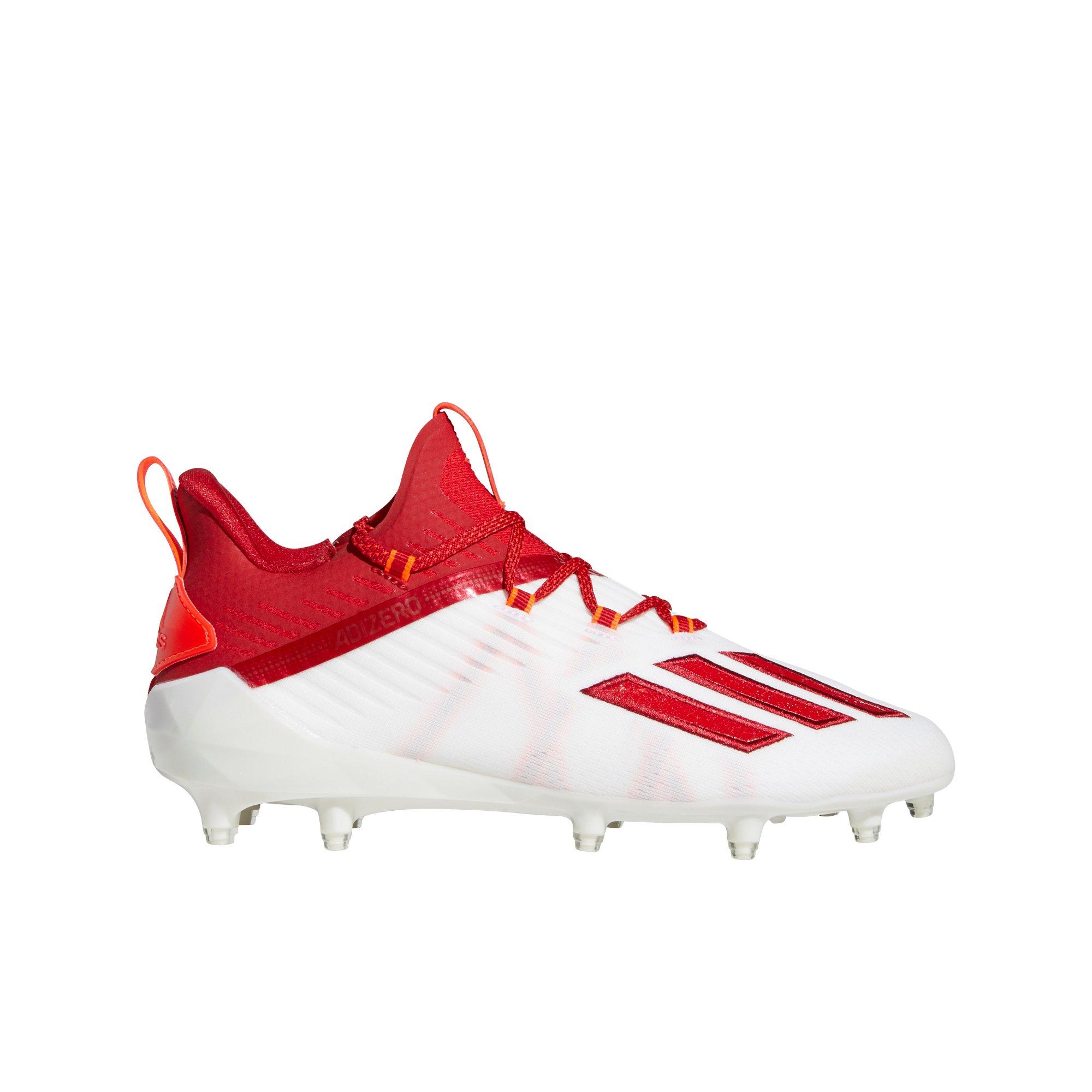 Red adidas store football cleats