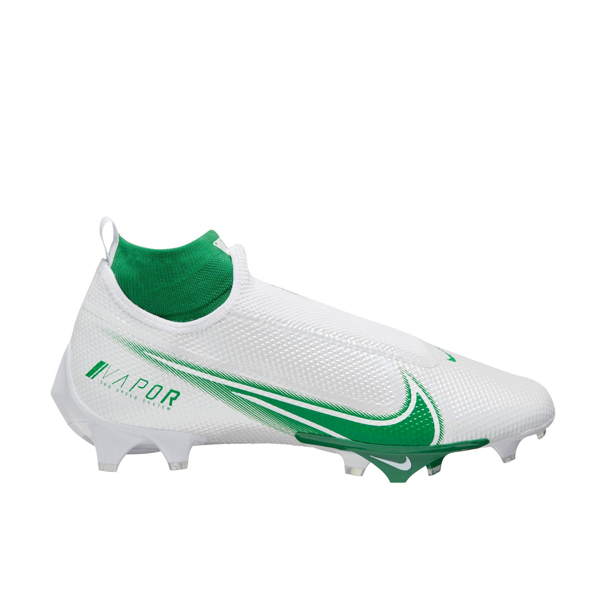 green and white nike cleats