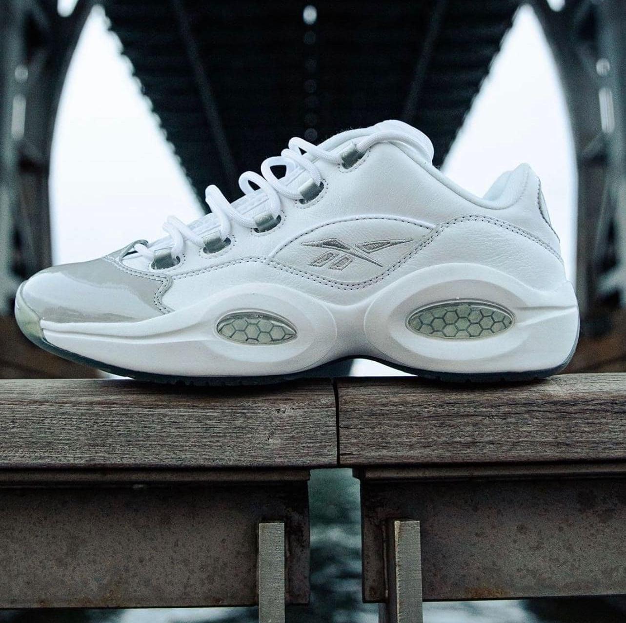 White and silver Reebok Question Low