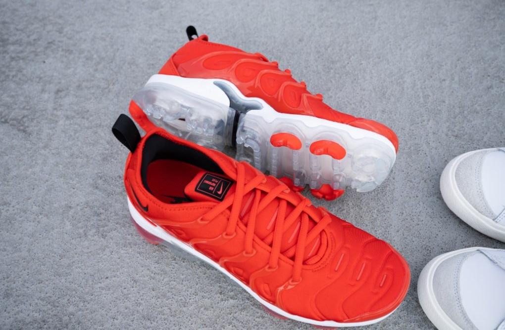 Red Nike VaporMax Plus sneakers