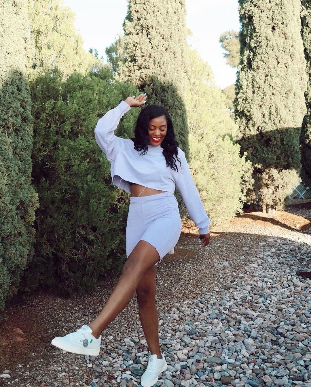 Reebok Club C, White biker shorts, and cropped swearshirt.